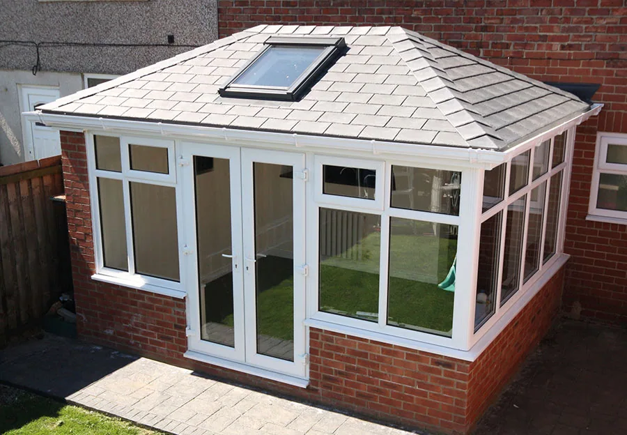 Tiled conservatory roof conversion on a British house