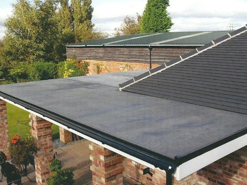 Flat roof and guttering on a UK garage
